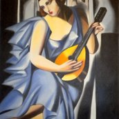 donna in blu con chitarra
