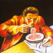 Uomo che mangia gli spaghetti