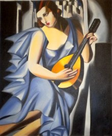 donna in blu con chitarra